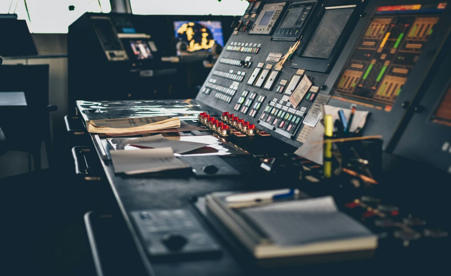 Industrial control room and operational monitoring systems representing governance, compliance, and risk management for IoT and OT environments.