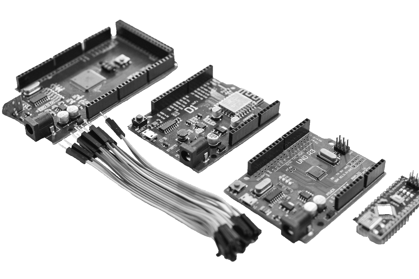 Collection of Arduino-compatible development boards, jumper wires, and IoT microcontrollers used for embedded systems development, hardware prototyping, and IoT security testing.