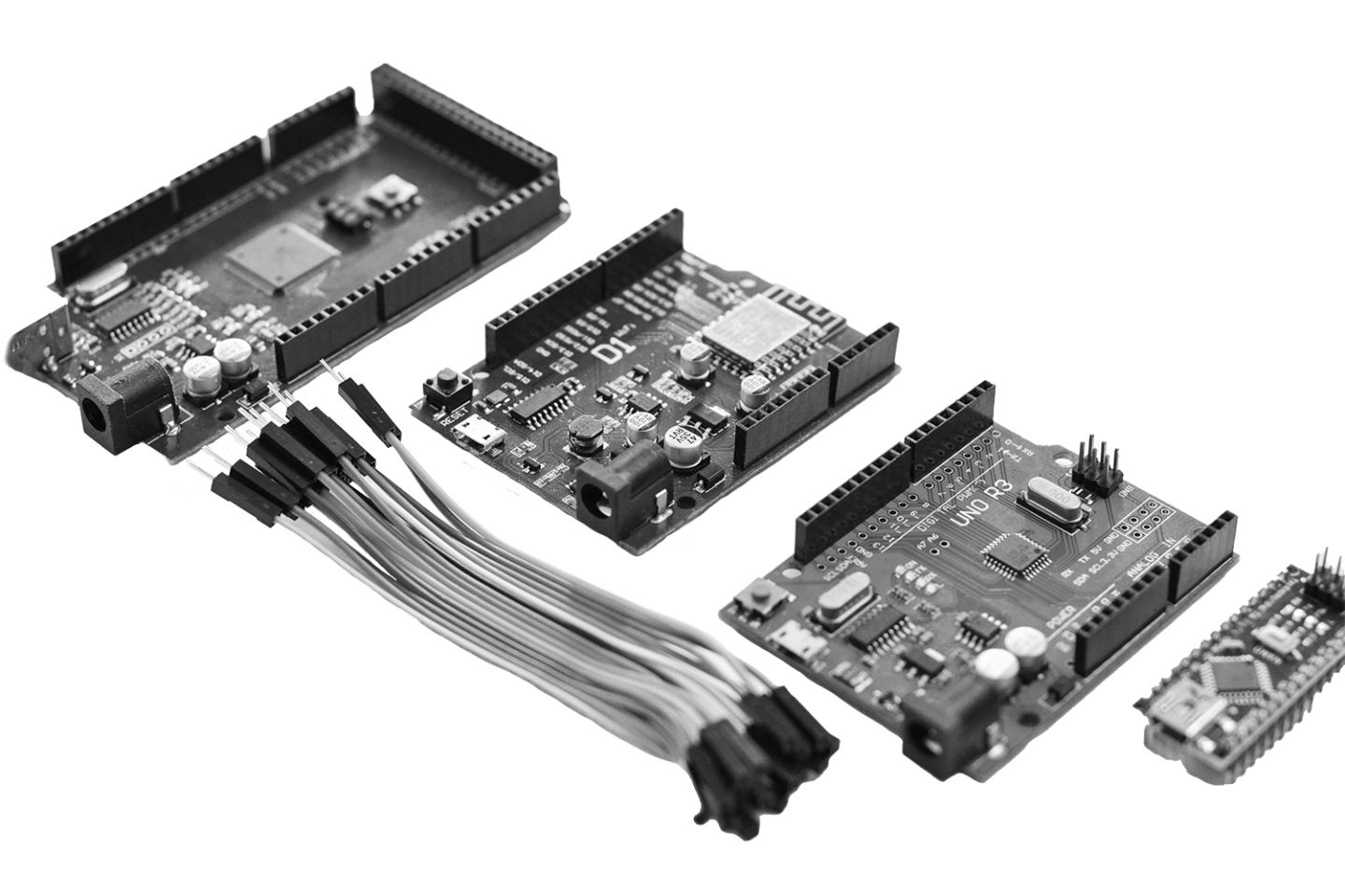 Collection of Arduino-compatible development boards, jumper wires, and IoT microcontrollers used for embedded systems development, hardware prototyping, and IoT security testing.